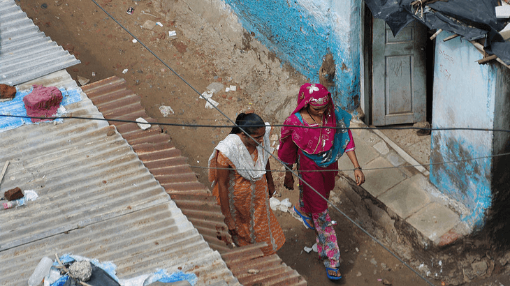 Two women walking on the street